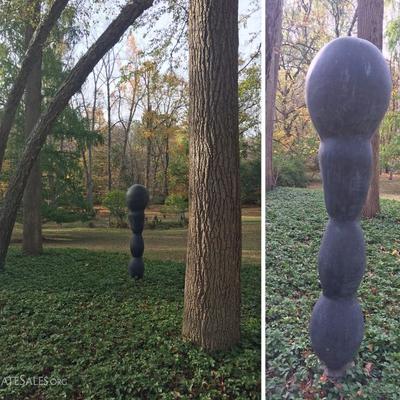 Brancusi-inspired bronze lawn sculpture