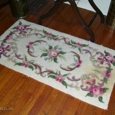 Several hooked rugs in this sale