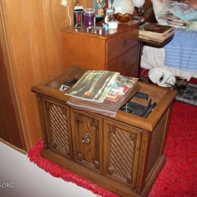 THIS IS A RECORD PLAYER AND 8 TRACK TAPE CONSOLE