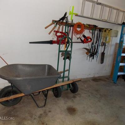 wheelbarrow, yard tools, ladder