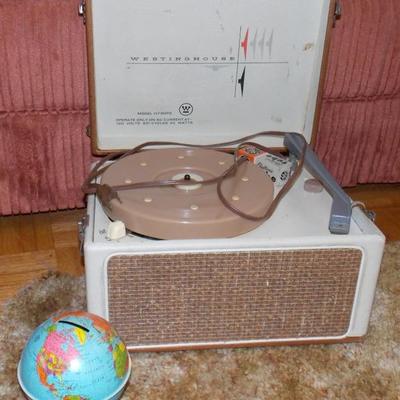 Vintage portable record player, metal globe bank