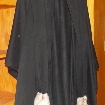 Cape with raccoon tail wrap
