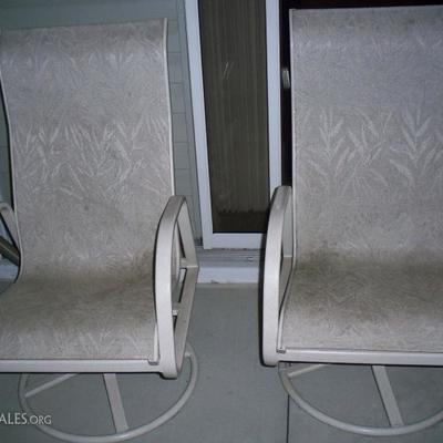 2 - Swivel patio chairs