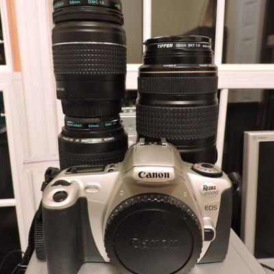 Canon Camera with Several Lenses