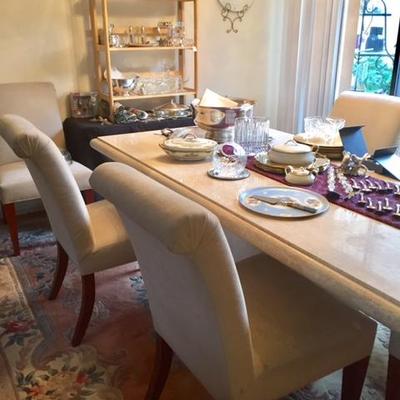 Travertine solid stone Dining Table and 6 Off White Ultrasuede Parson's chairs.