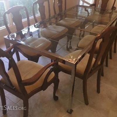 Chrome & Glass Dining Table with leaf is 6 ft.
Chairs sold separately.