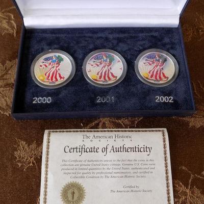 ADK013 Three Colorized American Eagle Silver Dollar Coins
