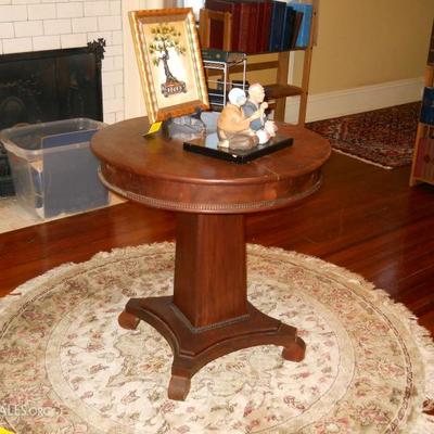 round rug, round pedestal table, original framed art, Oriental figurines, etc.