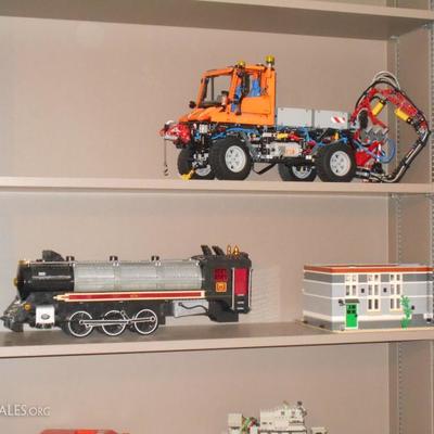 Many toys including Extensive LEGO collection and sculptures.