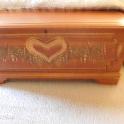 Storage chest with heart embellishment