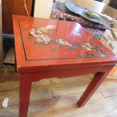 Red lacquered  table $25