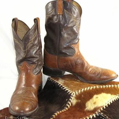 Tony Lama of El Paso, Texas Short 2-Tone Brown Smooth Leather Boots Shown on a Pieced Patchwork Cowhide
