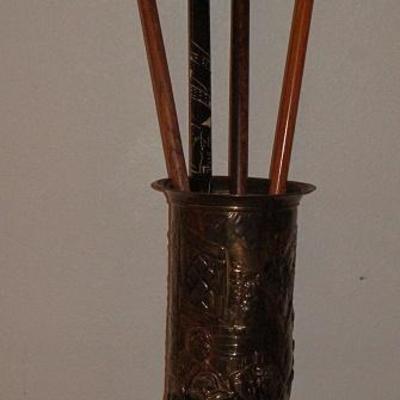 Embossed Brass Umbrella Stand with a Collection of Walking Canes 