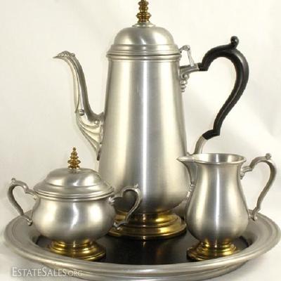 Oneida Heirloom Pewter Coffee Service (4 pcs.). Each Piece has a Brass Base and the Coffee Pot and Sugar Bowl have Brass Finials.  The...