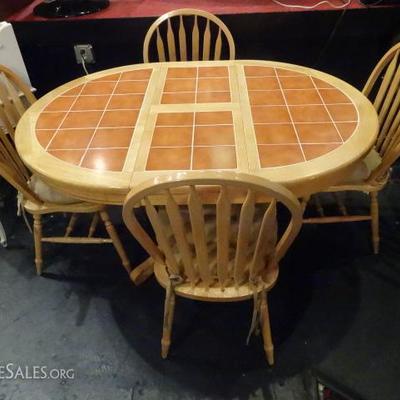 TILE TOP DINING TABLE WITH LEAF AND 4 CHAIRS, SHOWN HERE AS OVAL WITH LEAF INSTALLED