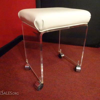 LUCITE STOOL ON CASTERS