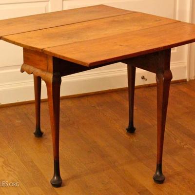 antique Queen Anne style petite drop leaf table in walnut