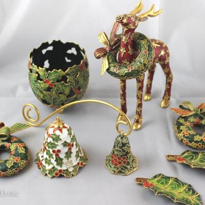 Lot of 8 cloisonne items: a deer, two wreath, a candle holder, a bell, two leafs, and a candle snuffer.
