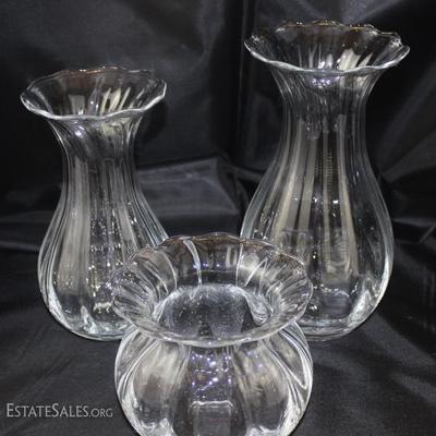 Three hand blown clear glass vases. Measures, tallest one is 9