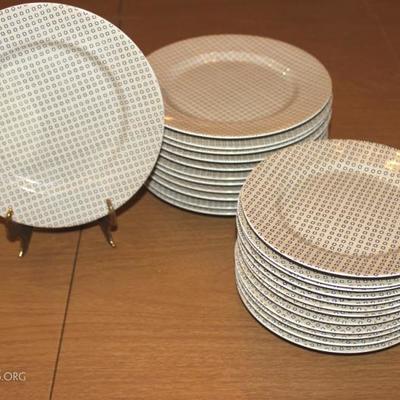 12 Fitz and Floyd saucers. 12 Fitz and Floyd bread plates. Both sets of 12 are in the Foulard pattern - Taupe and black.

