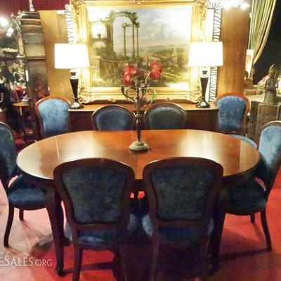 OVAL DINING TABLE WITH 6 CHAIRS AND ONE LEAF, DARK FINISH, CHAIRS UPHOLSTERED IN ROYAL BLUE CHENILLE, MATCHING SIDEBOARD AND BREAKFRONT...