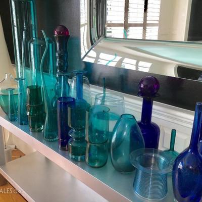 Beautiful signed art glass throughout the house