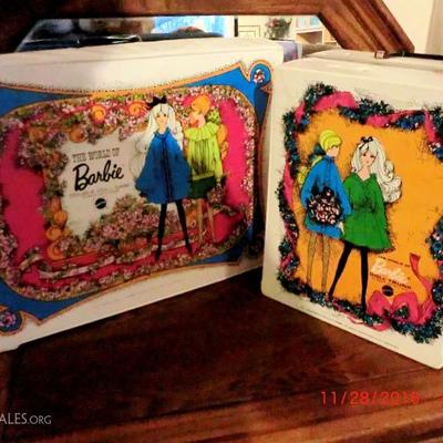 Vintage Barbie cases with dolls and accessories