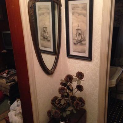 Shaped mirrors and framed prints