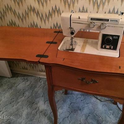 Vintage Capitol sewing machine and cabinet