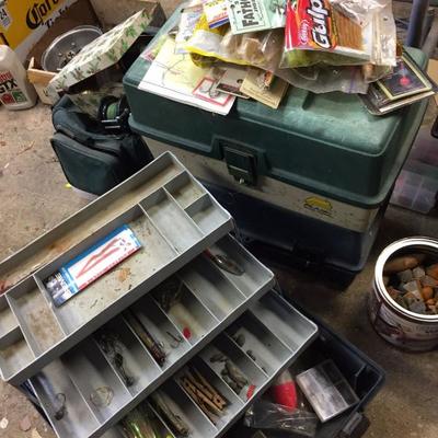 Variety of tackle boxes and fishing gear