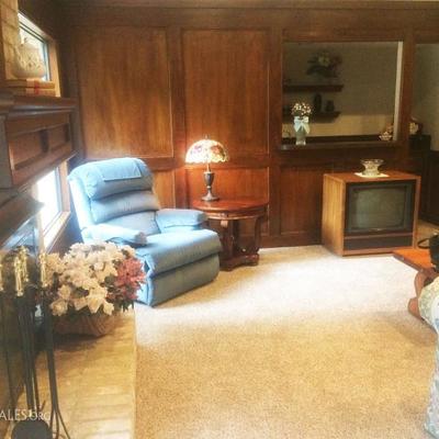 recliner, end table, lamps, fireplace tools