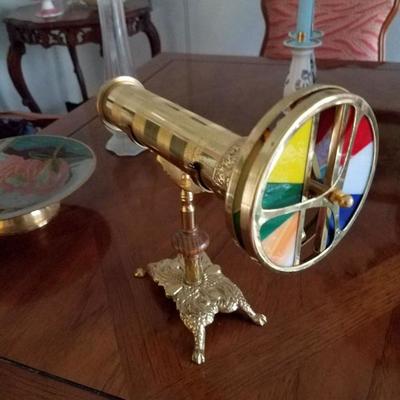 Brass kaleidoscope in bracket holder