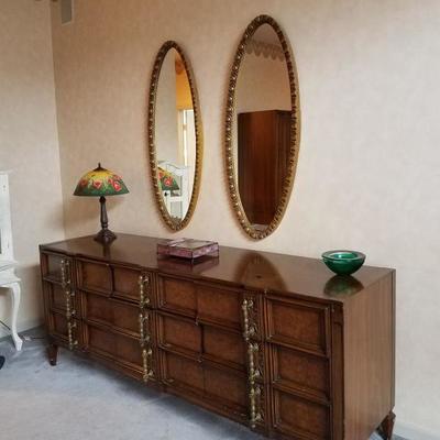 Matching mid-century dresser with pair of coordinating oval mirrors