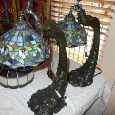 These two matching peacock-themed stained glass lamps are super!