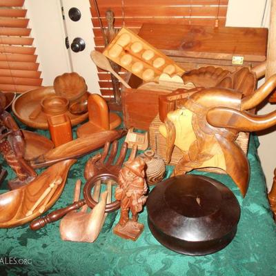 There are many carved wood items in several woods, in Southwest, African or other themes.