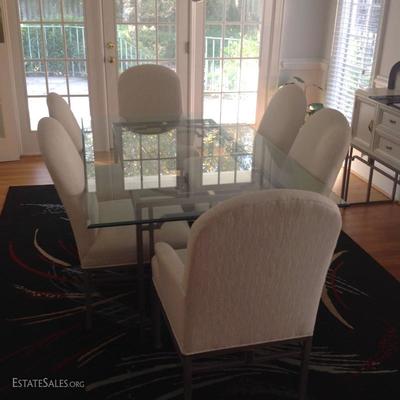 Beveled Glass Dining Table with 6 Upholstered Chairs (2 Captains) - minor stains on a couple of the chairs - 44