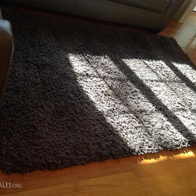 100 % Wool pile area rug - dark purple - gray in color - 60