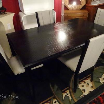 MODERN BLACK DINING TABLE WITH ALLIGATOR SKIN EMBOSSED TOP AND 4 GRAY LEATHER CHAIRS, INCLUDES LEAF