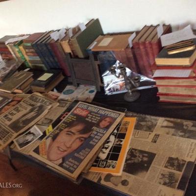 Elvis collectables and antique books.