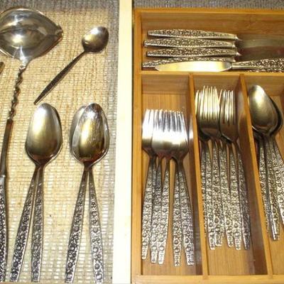 Stainless flatware complete with serving pieces