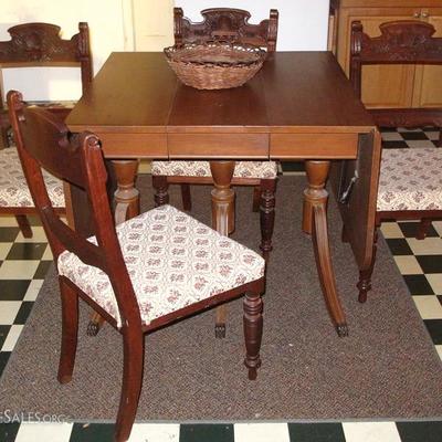 Duncan Phyfe Style Drop-Leaf Table with Three Pedestal Legs and Metal Claw Feet. Circa 1930. Measures approx. 30