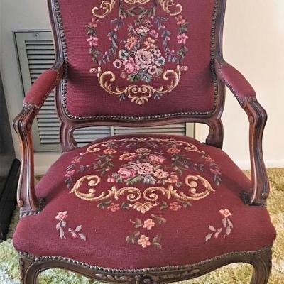 Parlor chair with embroidered upholstery 