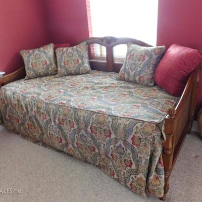 trundle day bed with caning on back and sides
