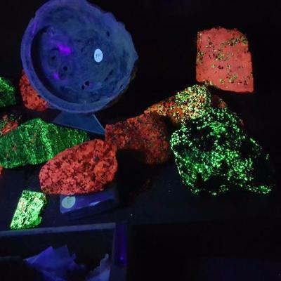 Rock specimens under a black light