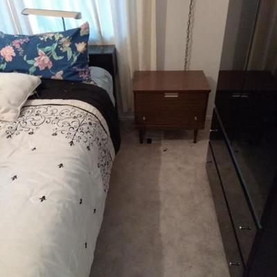 Queen size bed and end table