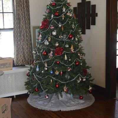 lots of glass ornaments and Balsam hill artificial tree