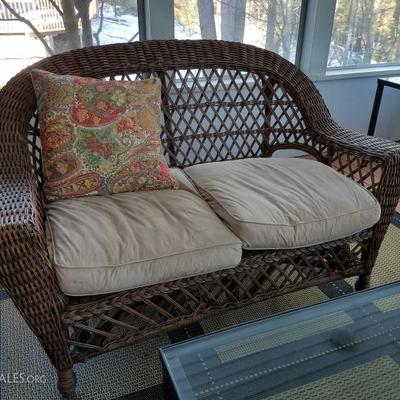 Wicker loveseat, goes with the two chairs.
