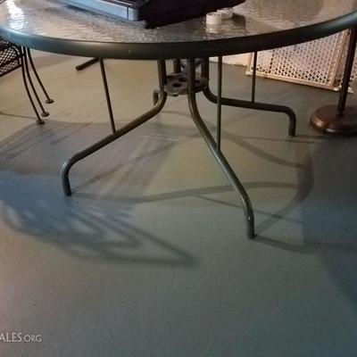 Glass and metal patio table