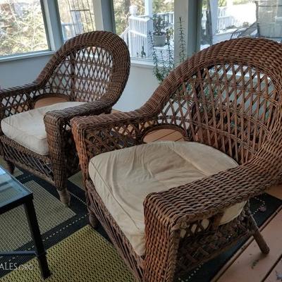 Wicker chairs. There is also a loveseat.