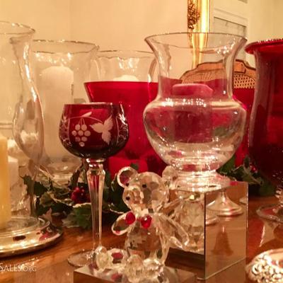 Candle collection with silver, glass and crystal holders -- including hurricanes, votives, and Crate and Barrel items. More than 300...